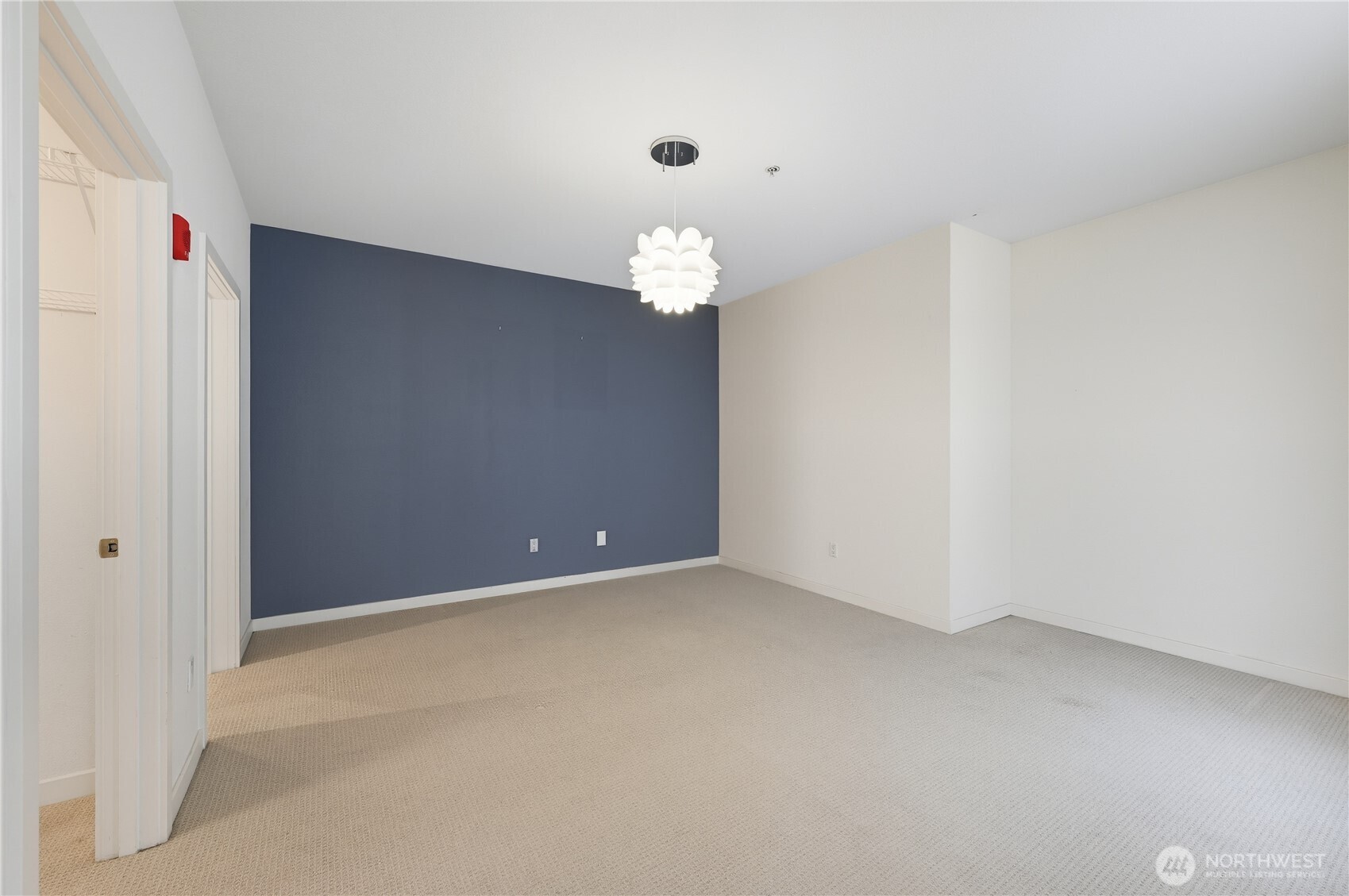 303 23rd Avenue South, Unit 602 Seattle, WA 98144 - Photo 17 of 26 a view of an empty room with a window
