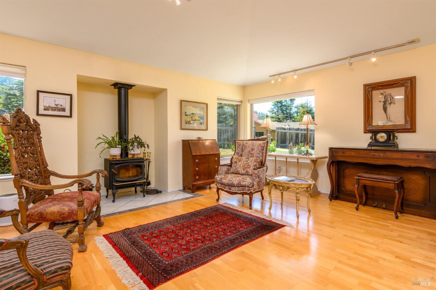 15721 Forest View Road Manchester, CA 95459 - Photo 16 of 50 A cozy wood fireplace offers additional warmth and lovely ambience! This home also features forced air heating throughout...