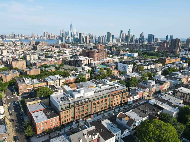 a view of a building from a balcony