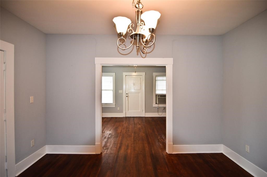1905 Stevens Street, Unit 2 Houston, TX 77026 - Photo 14 of 22 a view of room with wooden floor