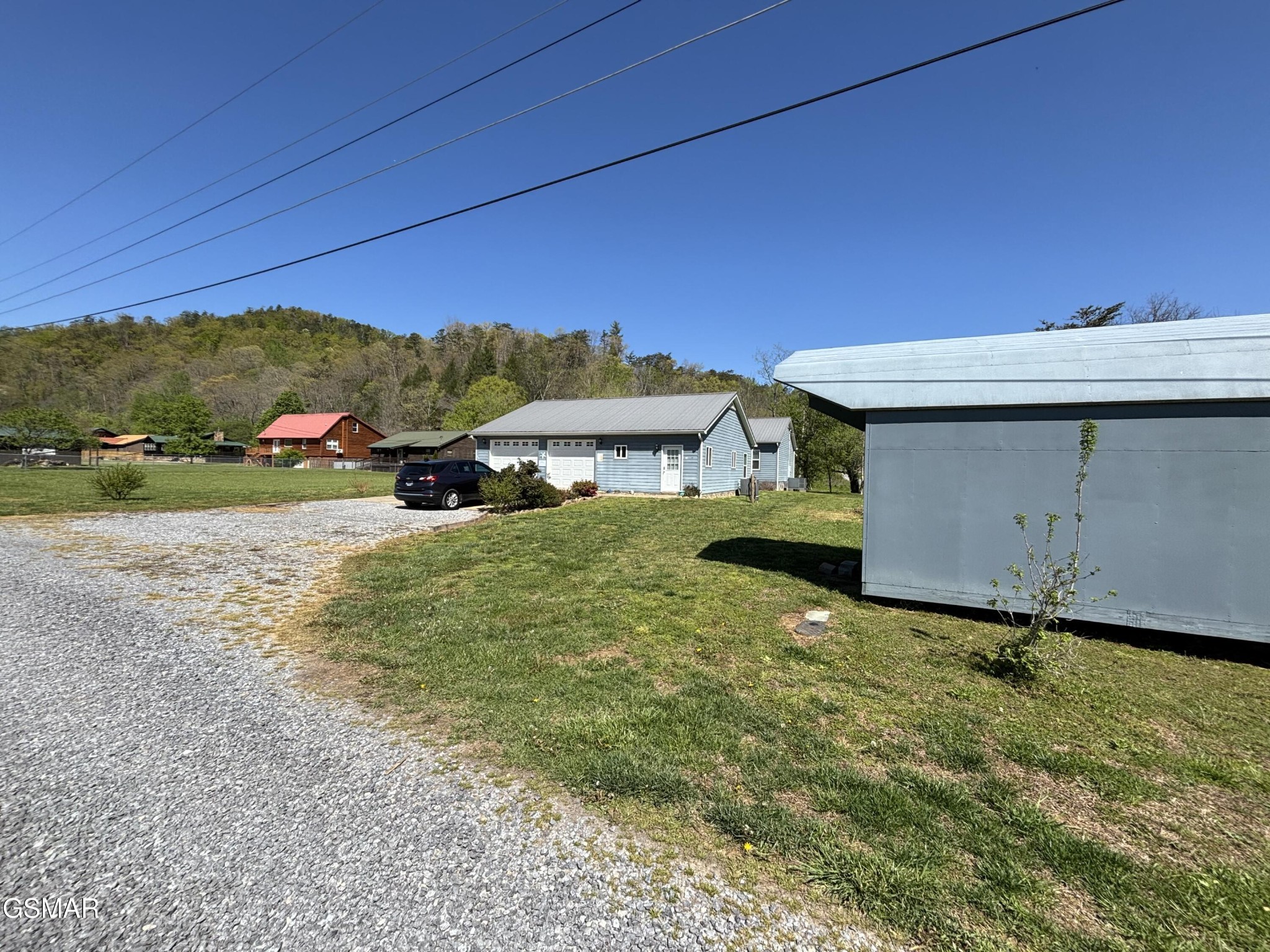 147 Padgett Mill Road Cosby, TN 37722 - Photo 17 of 36 a view of a house with a yard