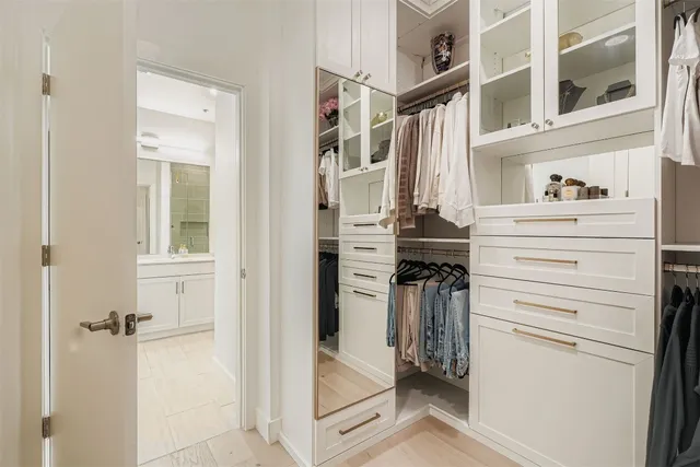 front view of a utility room with closet and racks