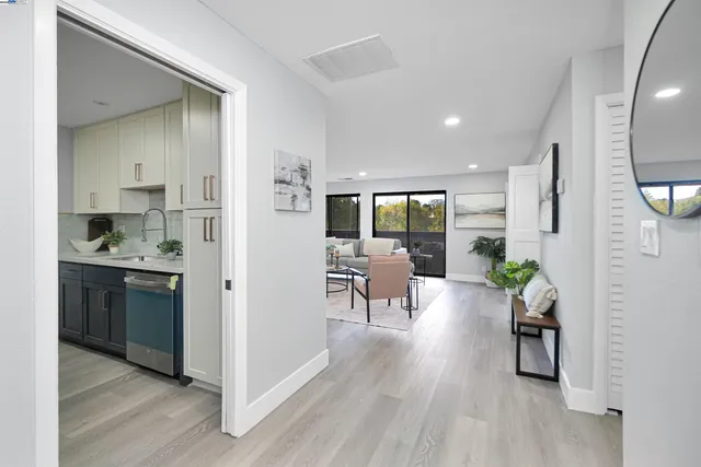 a living room with furniture fireplace and flat screen tv