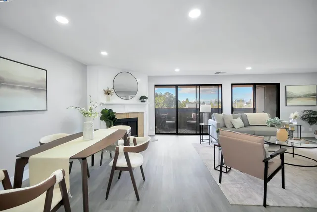 a large kitchen with stainless steel appliances lots of counter space and a sink