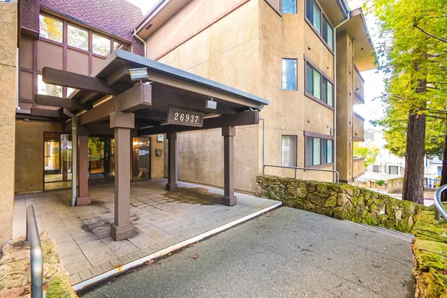 a view of a house with a street