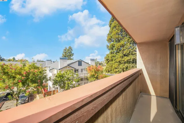 a view of a street with cars