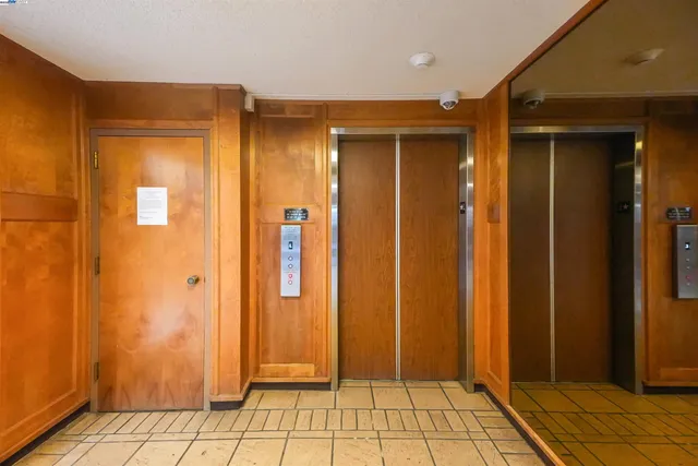 a view of a hallway with bathroom