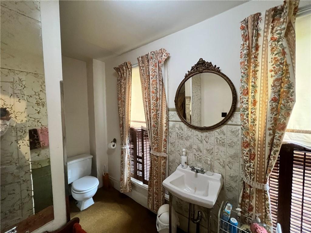 1734 Wright Road Rochester Mills, PA 15771 - Photo 12 of 25 a bathroom with a toilet sink and mirror