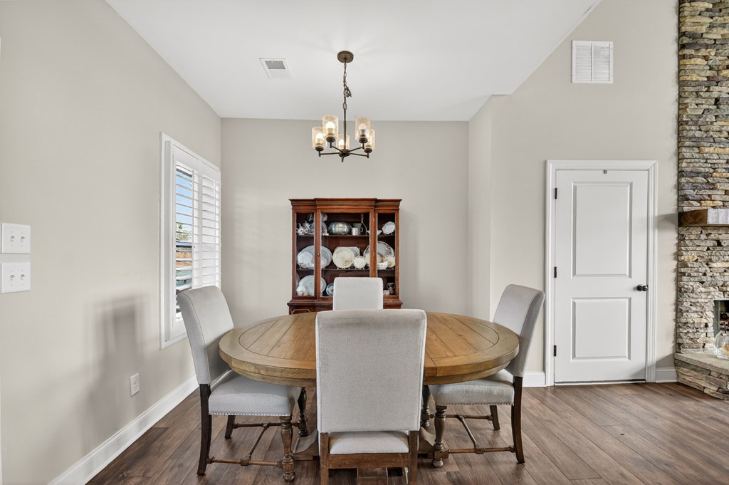 28 Mountaintown Road Ellijay, GA 30540 - Photo 13 of 54 a view of a dining room with furniture window and wooden floor