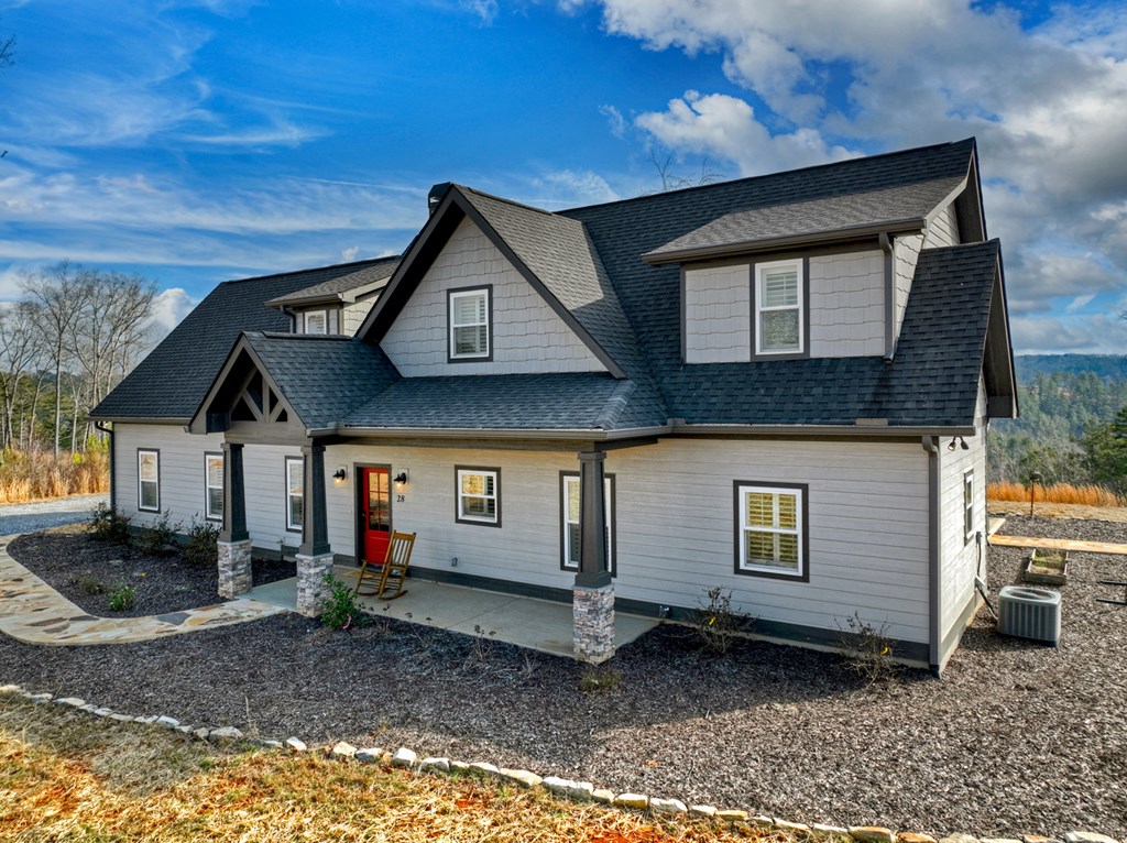 28 Mountaintown Road Ellijay, GA 30540 - Photo 38 of 54 a front view of a house with garden