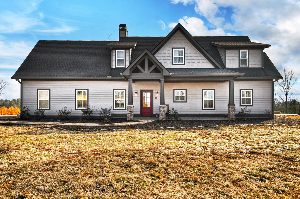 28 Mountaintown Road Ellijay, GA 30540 - Photo 49 of 54 a front view of a house with a large tree