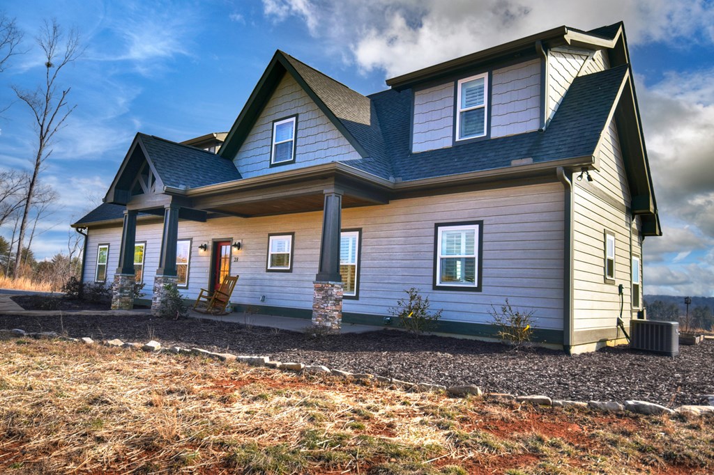 28 Mountaintown Road Ellijay, GA 30540 - Photo 50 of 54 a front view of a house with a yard