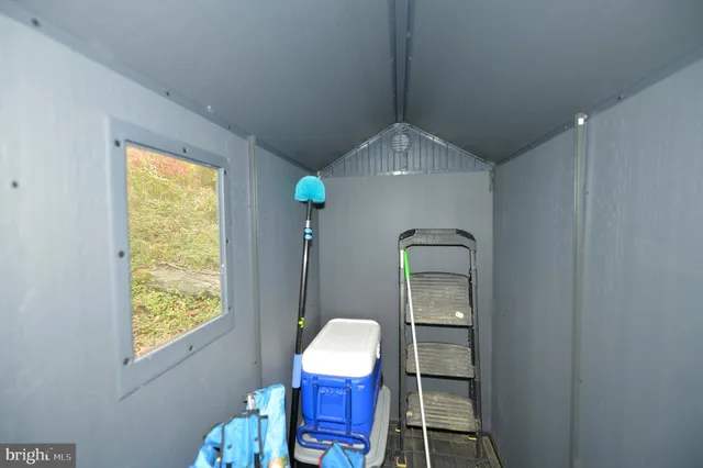 a workspace with furniture and window