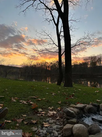 a view of a yard with an outdoor space