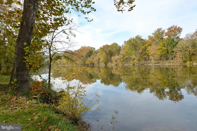 a view of lake with green space