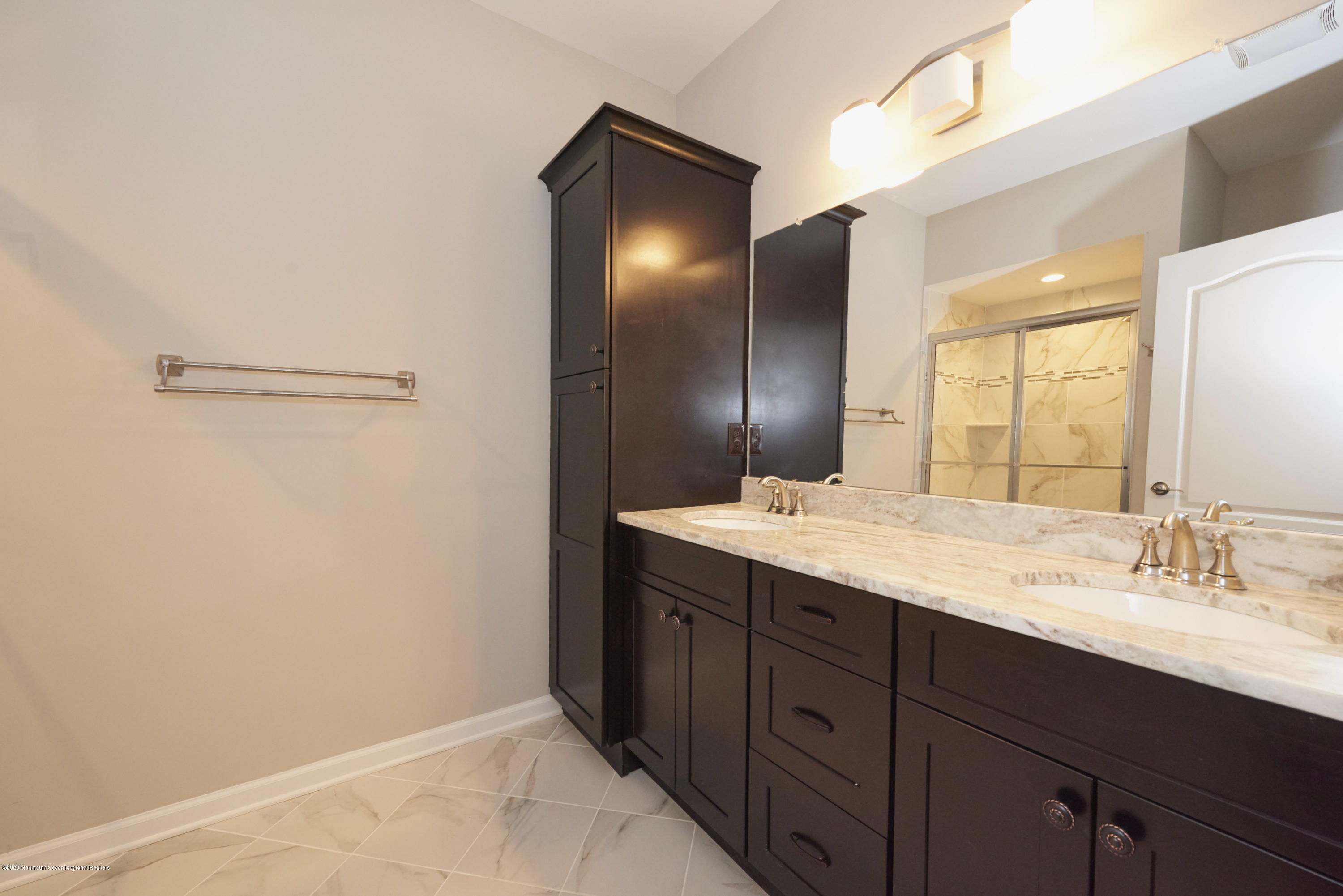 21 Green Tree Circle Hazlet, NJ 07730 - Photo 16 of 38 a bathroom with a granite countertop sink and a mirror