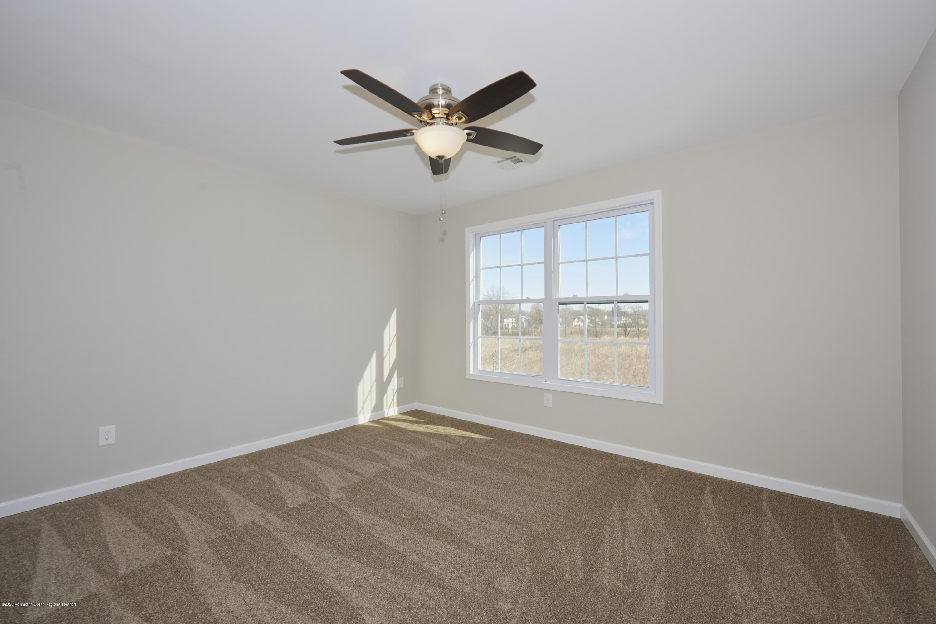 21 Green Tree Circle Hazlet, NJ 07730 - Photo 25 of 38 a view of empty room with ceiling fan