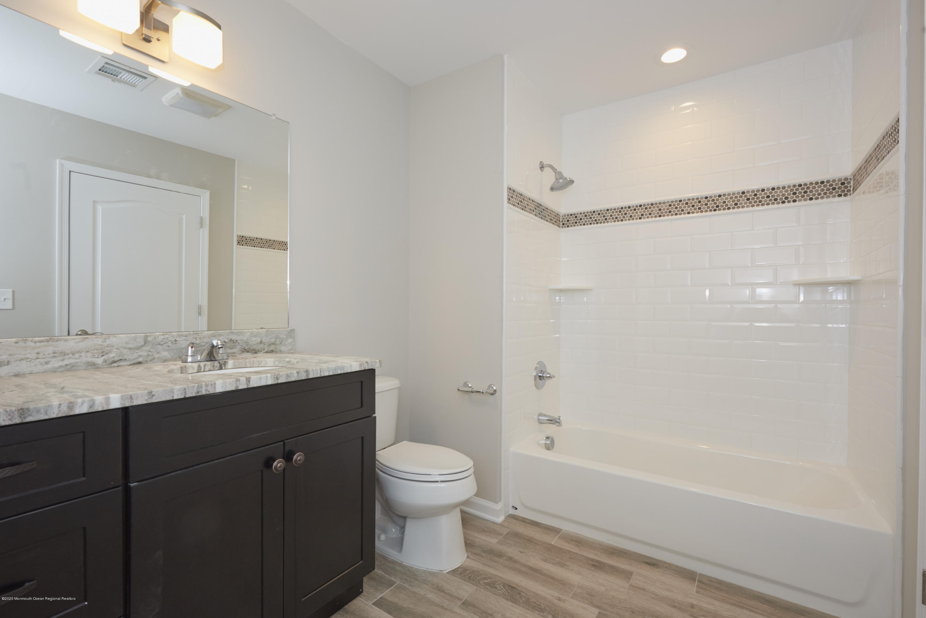 21 Green Tree Circle Hazlet, NJ 07730 - Photo 27 of 38 a bathroom with a granite countertop sink a toilet and shower