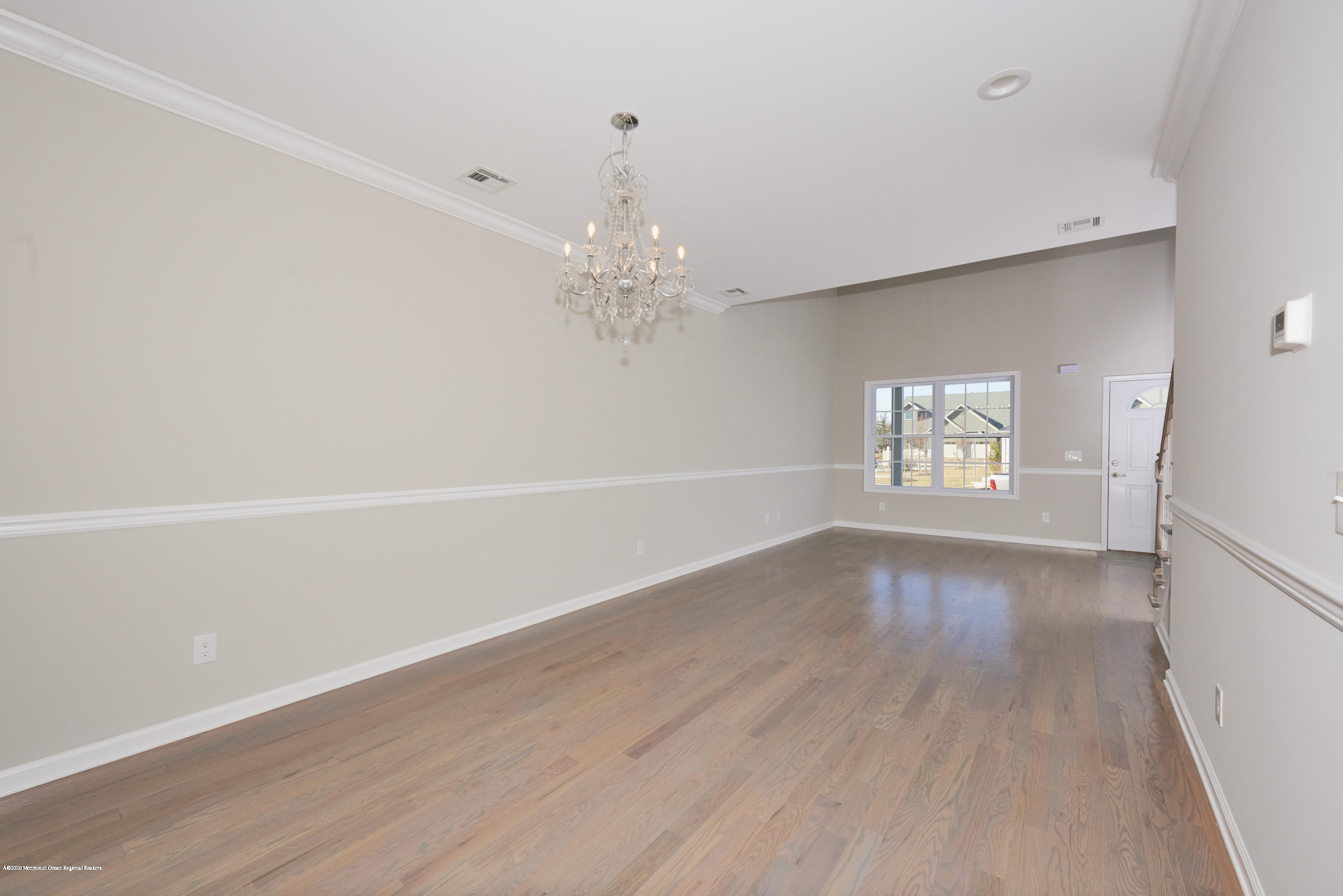 21 Green Tree Circle Hazlet, NJ 07730 - Photo 7 of 38 wooden floor in an empty room with a window