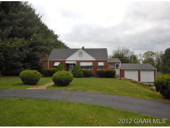 220 Henkel Road Waynesboro, VA 22980 - Photo 12 of 12 a front view of a house with a garden and yard