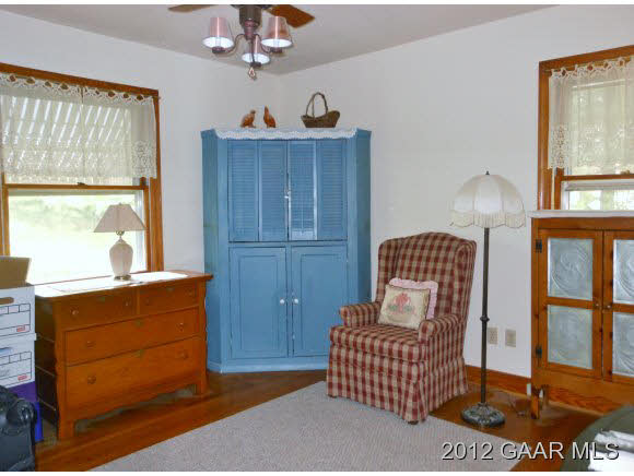 220 Henkel Road Waynesboro, VA 22980 - Photo 7 of 12 a living room with furniture a window and dresser