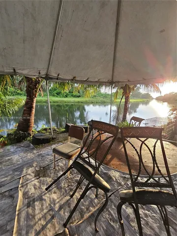 a view of an outdoor sitting area with golf course