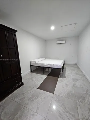 a living room with a black furniture