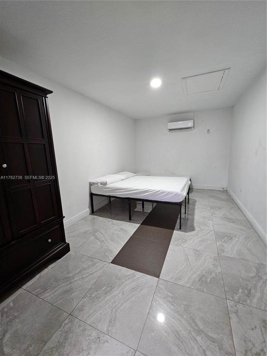 Westview Miami, FL 33167 - Photo 14 of 46 a living room with a black furniture