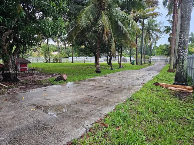 a view of a park with tree s