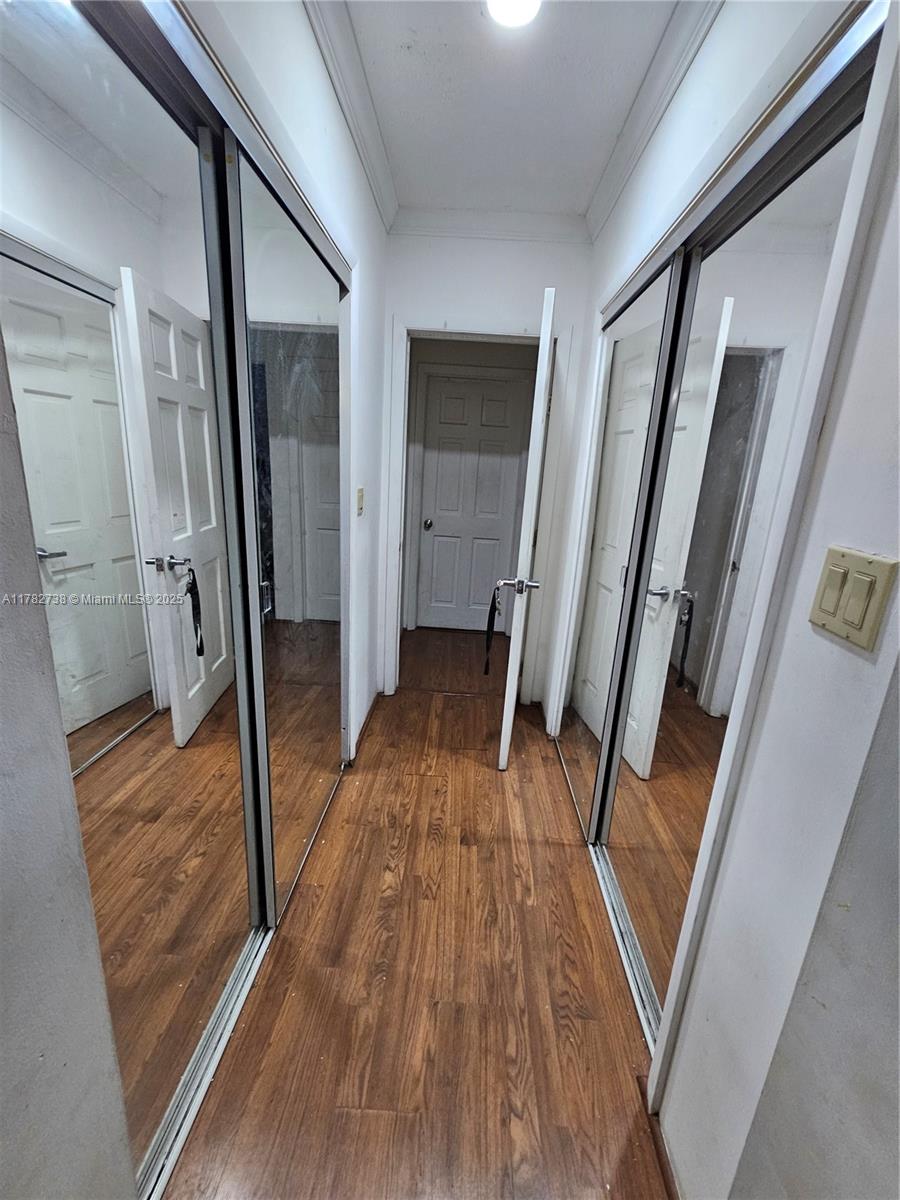 Westview Miami, FL 33167 - Photo 32 of 46 a view of a hallway with wooden floor and staircase