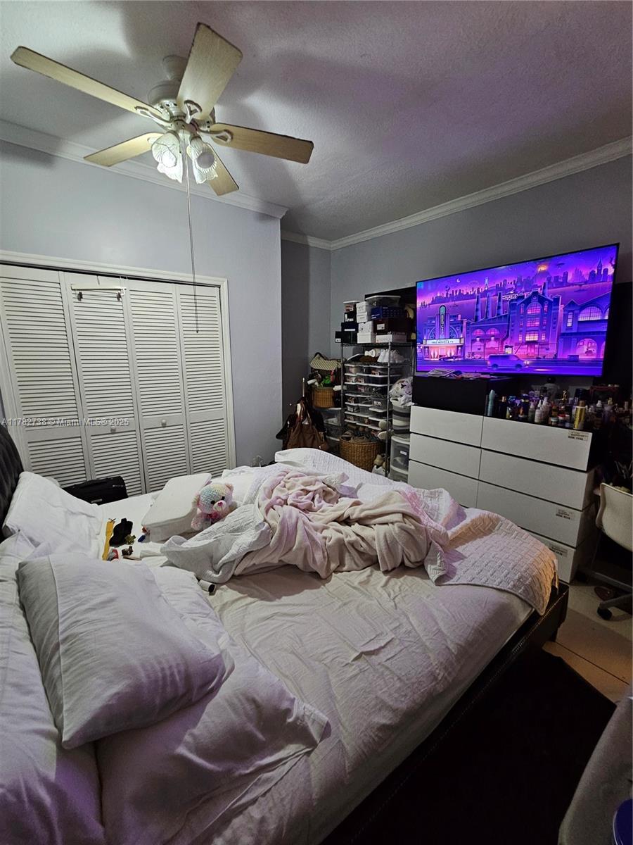 Westview Miami, FL 33167 - Photo 46 of 46 a bedroom with a bed and window