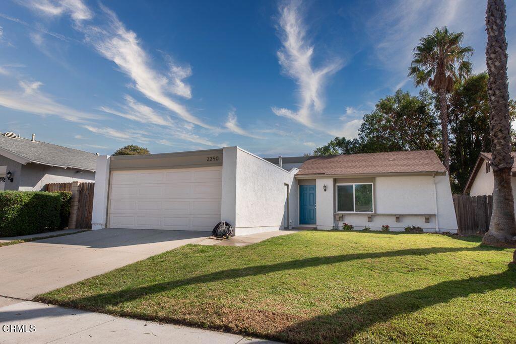 2250 North Goddard Avenue Simi Valley, CA 93063 - Photo 1 of 25 a front view of a house with garden