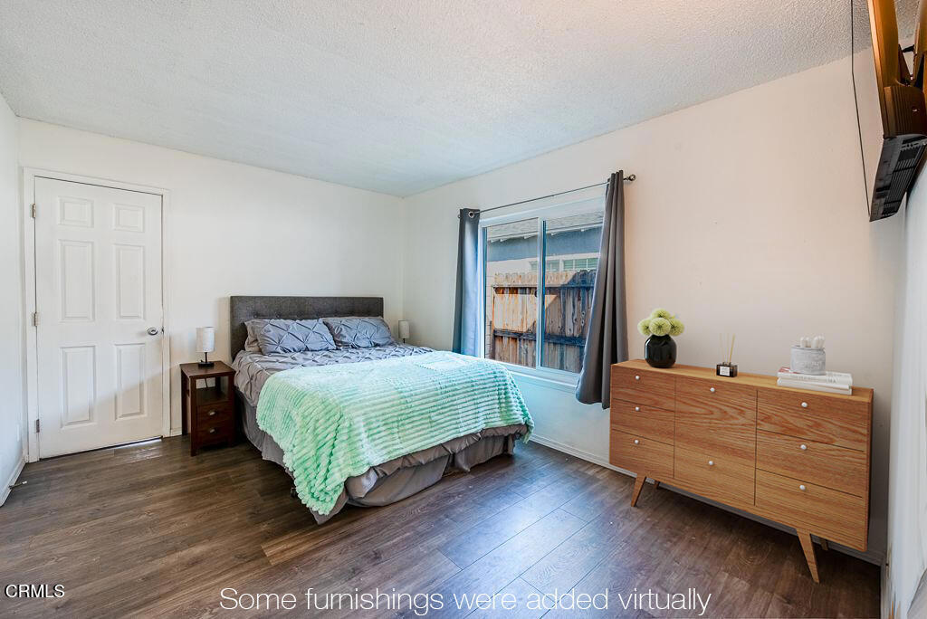 2250 North Goddard Avenue Simi Valley, CA 93063 - Photo 11 of 25 a bedroom with a bed and a window