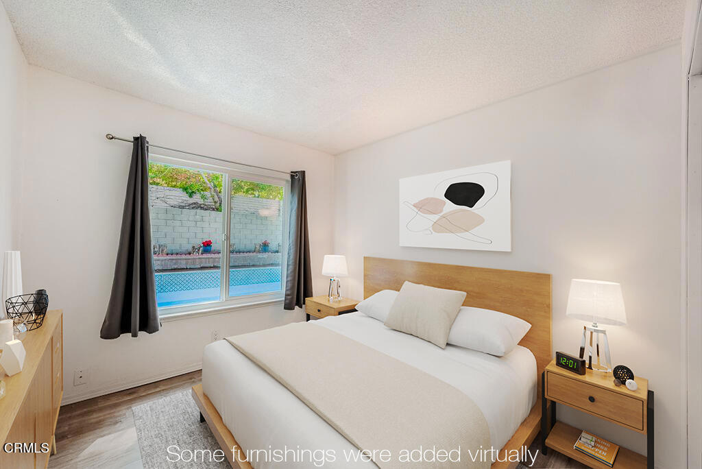 2250 North Goddard Avenue Simi Valley, CA 93063 - Photo 16 of 25 a bedroom with a bed and a window