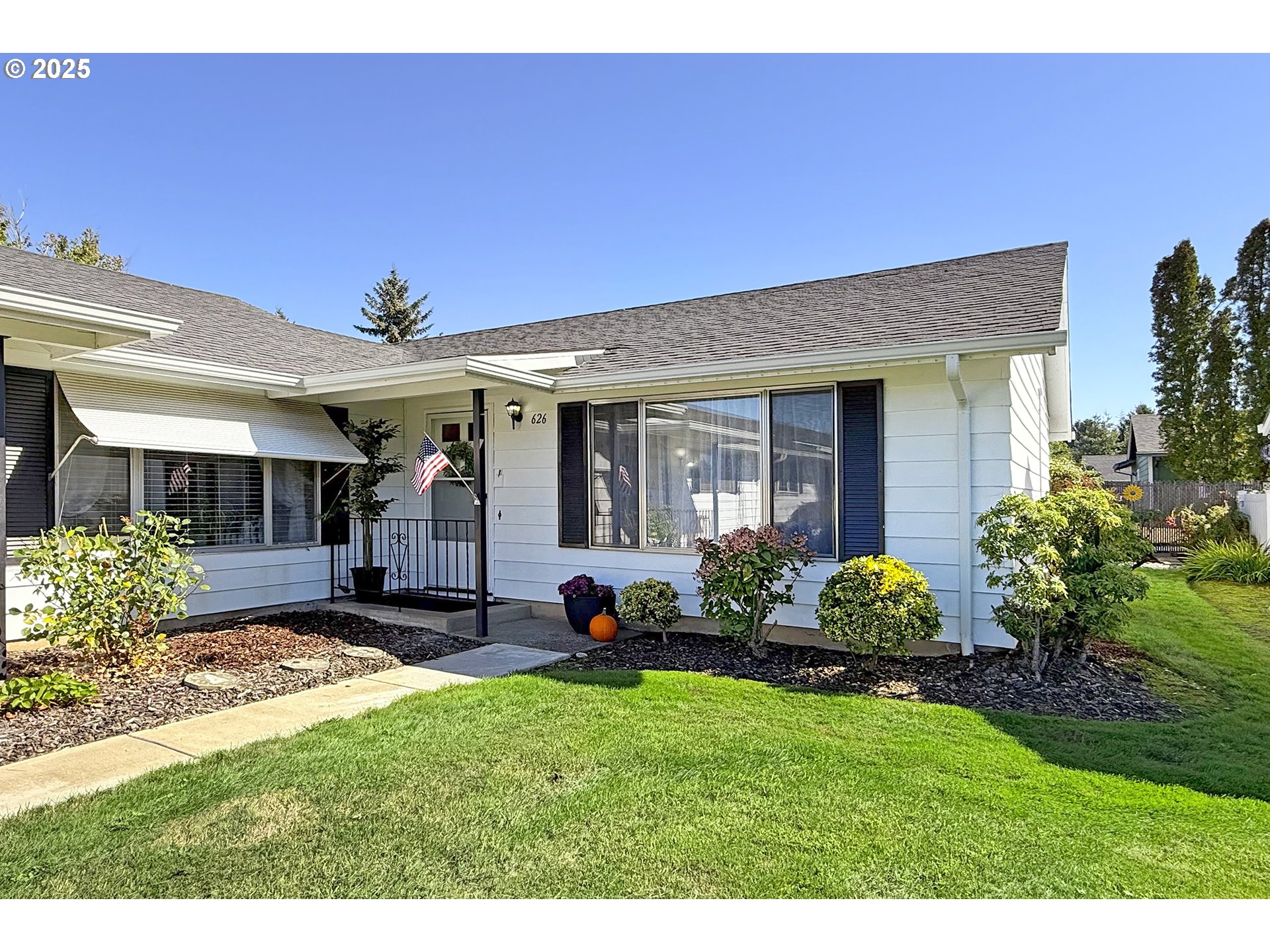 626 Northeast Fleming Avenue, Unit B63 Gresham, OR 97030 - Photo 1 of 45 a view of a house with garden and yard