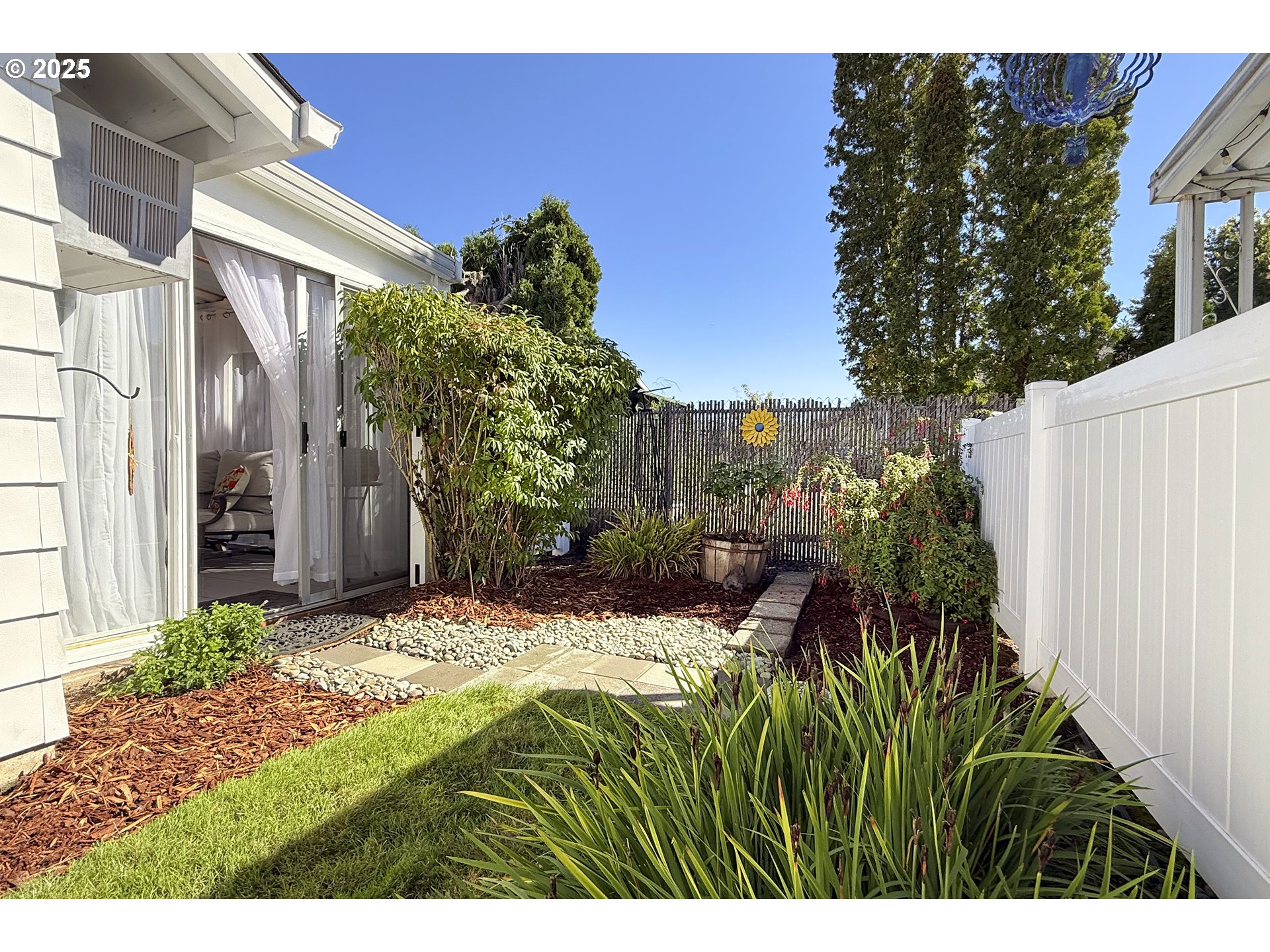 626 Northeast Fleming Avenue, Unit B63 Gresham, OR 97030 - Photo 11 of 45 a view of a house with a yard