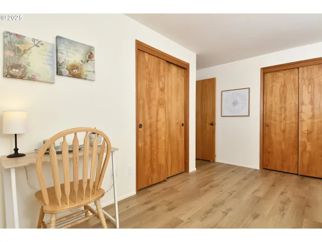 a view of a livingroom with furniture and wooden floor