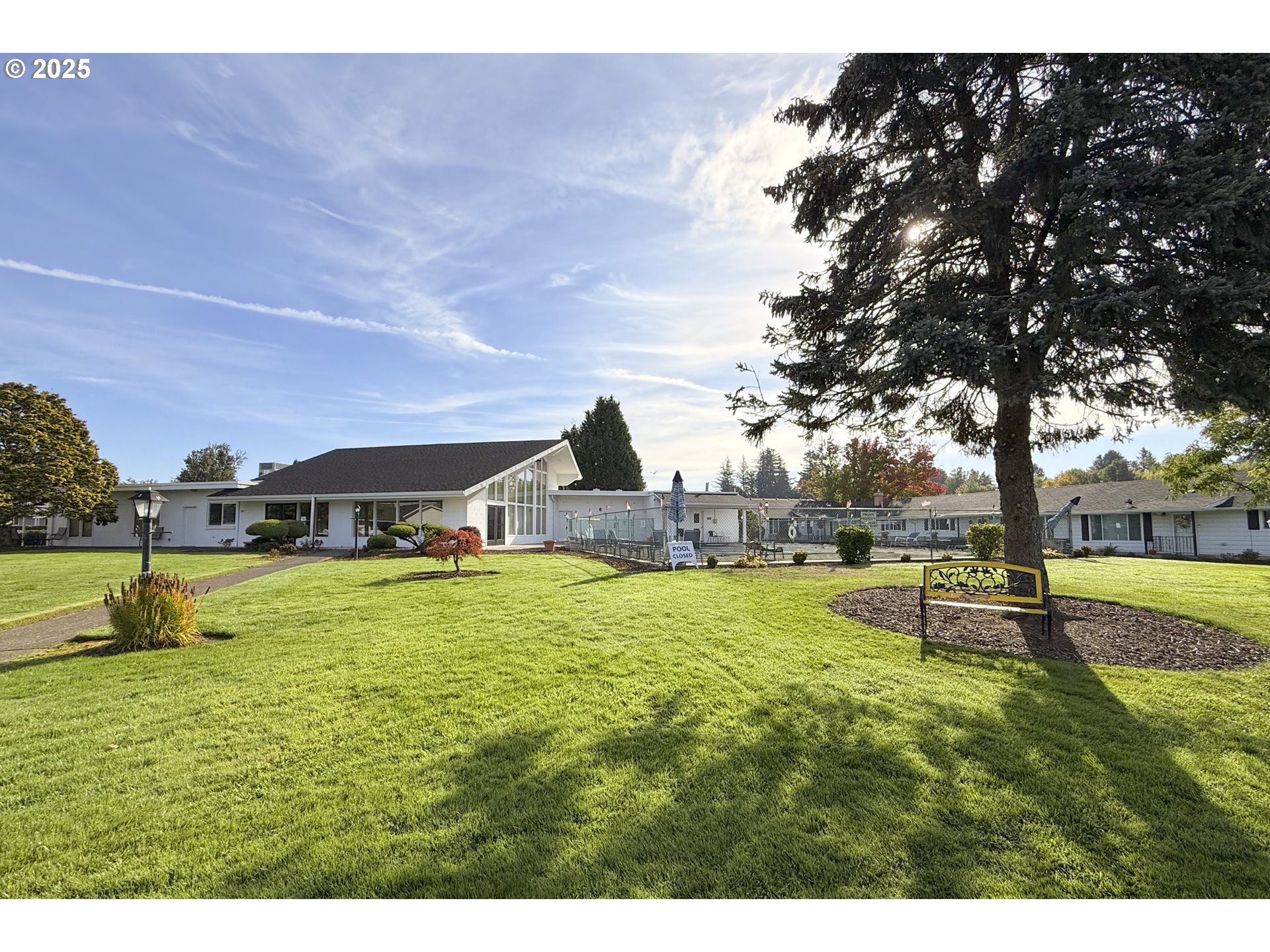 626 Northeast Fleming Avenue, Unit B63 Gresham, OR 97030 - Photo 35 of 45 a house with swimming pool in front of it