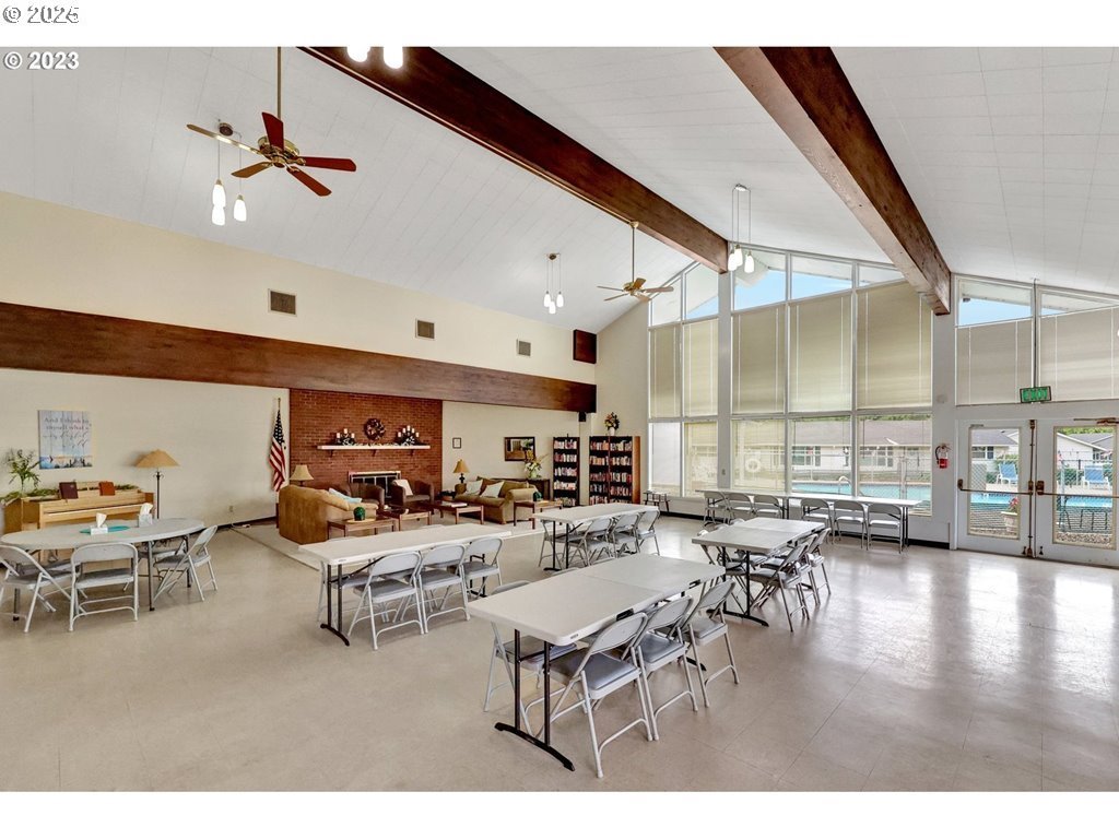 626 Northeast Fleming Avenue, Unit B63 Gresham, OR 97030 - Photo 39 of 45 a living room with lots of furniture and view of kitchen