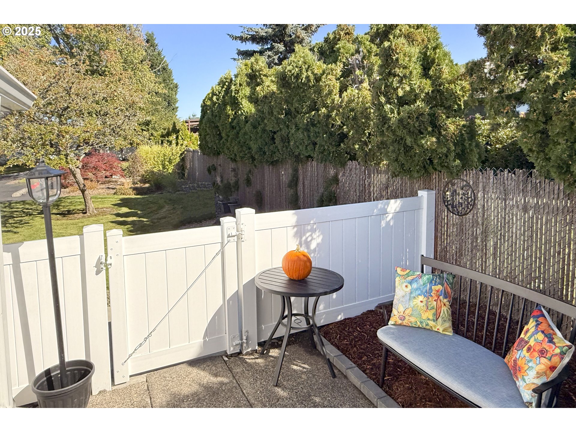 626 Northeast Fleming Avenue, Unit B63 Gresham, OR 97030 - Photo 4 of 45 a outdoor sitting area with furniture and wooden floor
