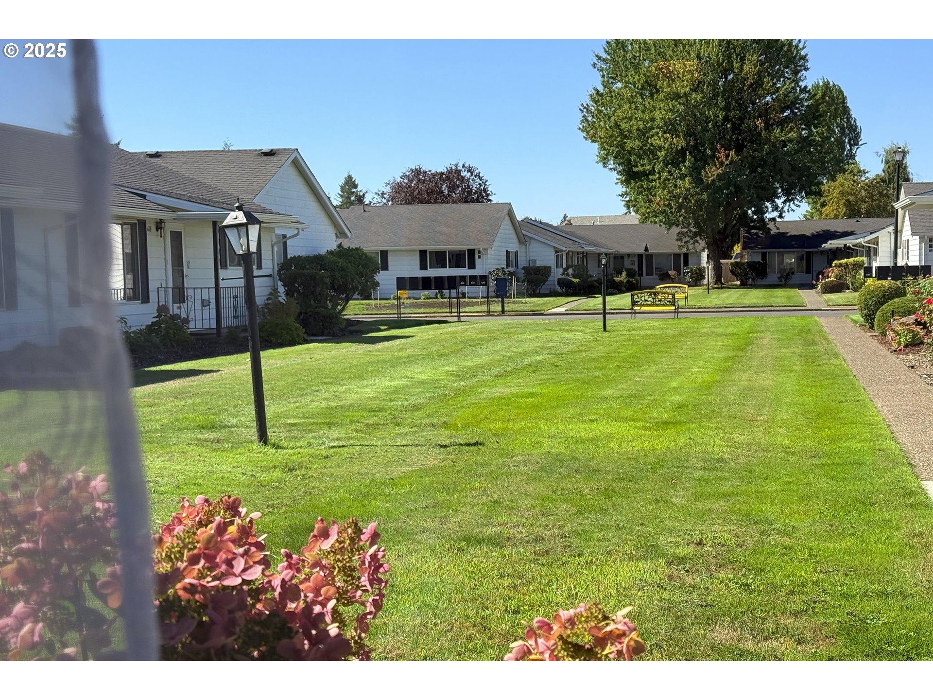 626 Northeast Fleming Avenue, Unit B63 Gresham, OR 97030 - Photo 44 of 45 a view of a house with a big yard