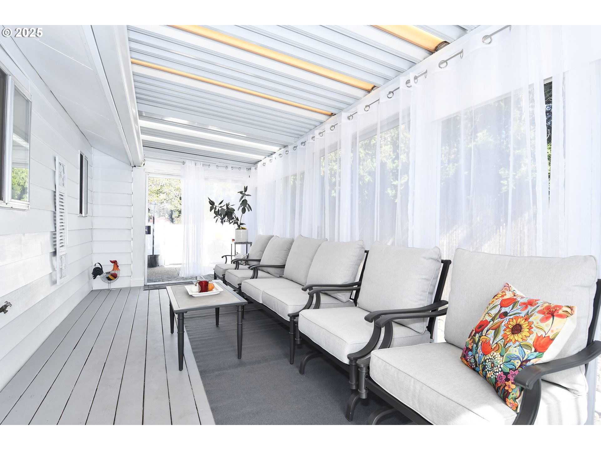 626 Northeast Fleming Avenue, Unit B63 Gresham, OR 97030 - Photo 8 of 45 a living room with furniture and a wooden floor