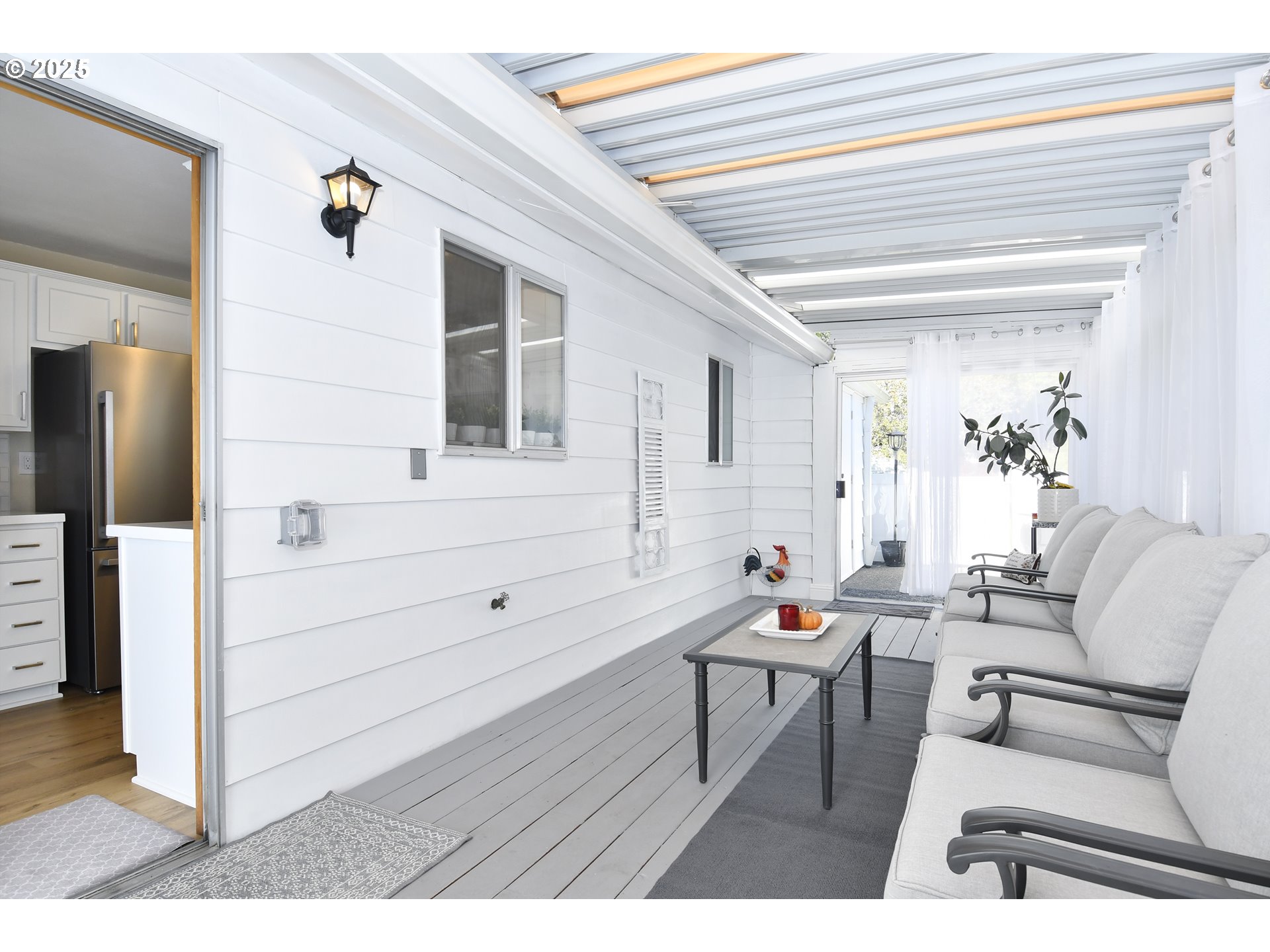 626 Northeast Fleming Avenue, Unit B63 Gresham, OR 97030 - Photo 9 of 45 a living room with furniture and a wooden floor