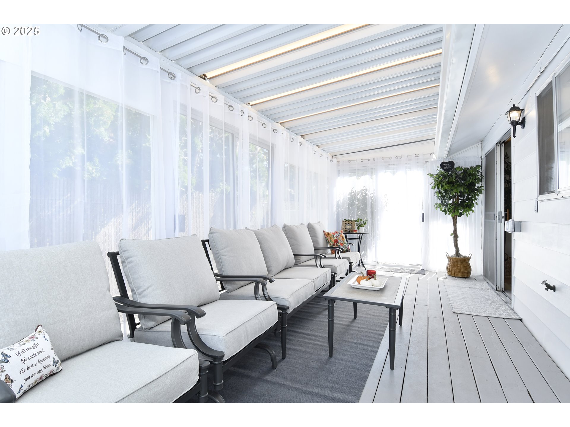 626 Northeast Fleming Avenue, Unit B63 Gresham, OR 97030 - Photo 10 of 45 a living room with furniture and a wooden floor