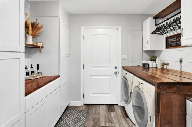 a kitchen with sink and cabinets