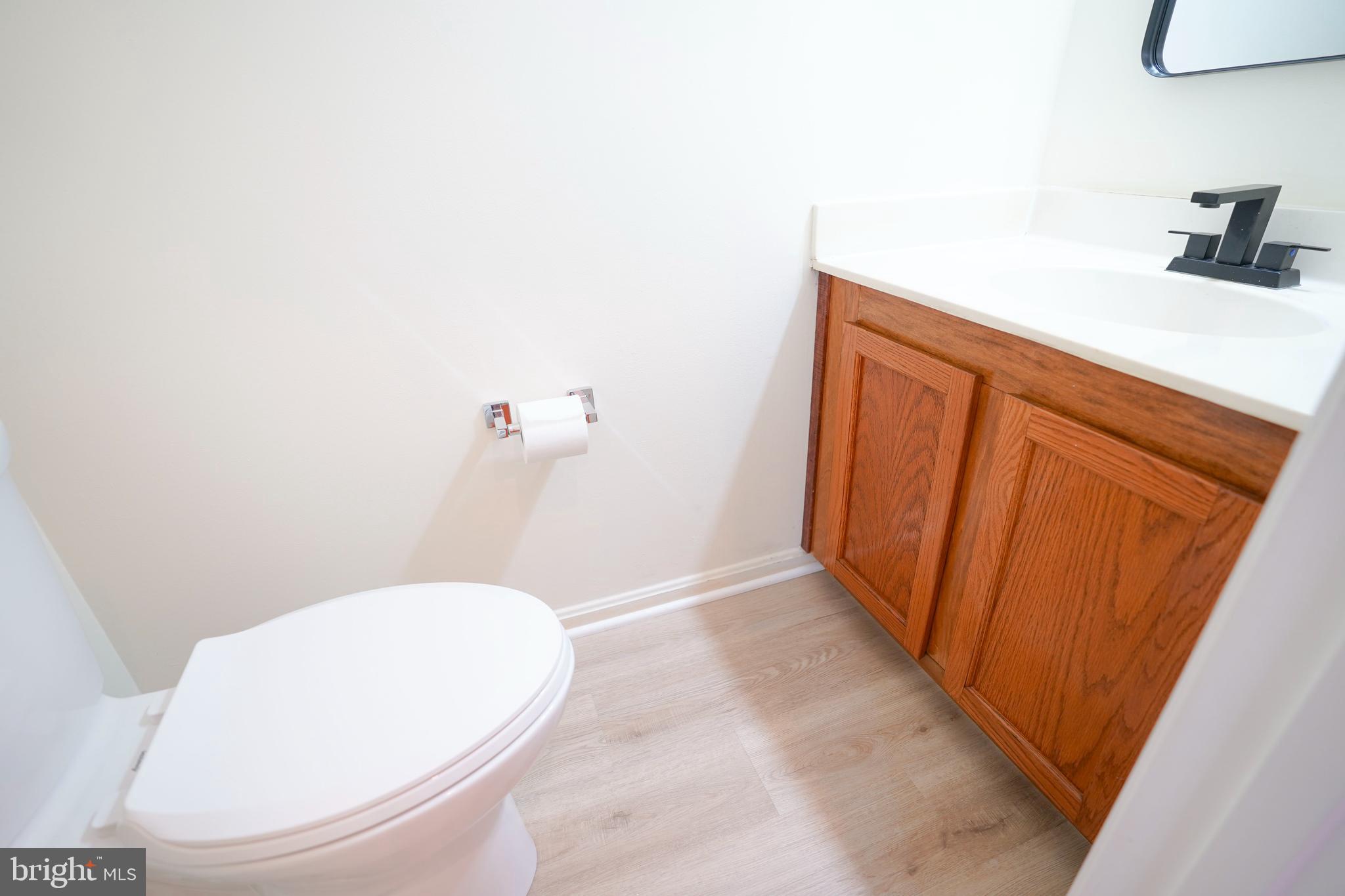 6903 Compton Lane Centreville, VA 20121 - Photo 14 of 35 a bathroom with a sink and a vanity