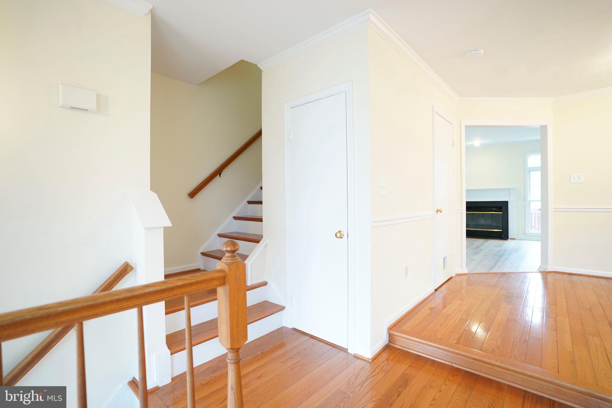 6903 Compton Lane Centreville, VA 20121 - Photo 15 of 35 a living room with wooden floor and furniture