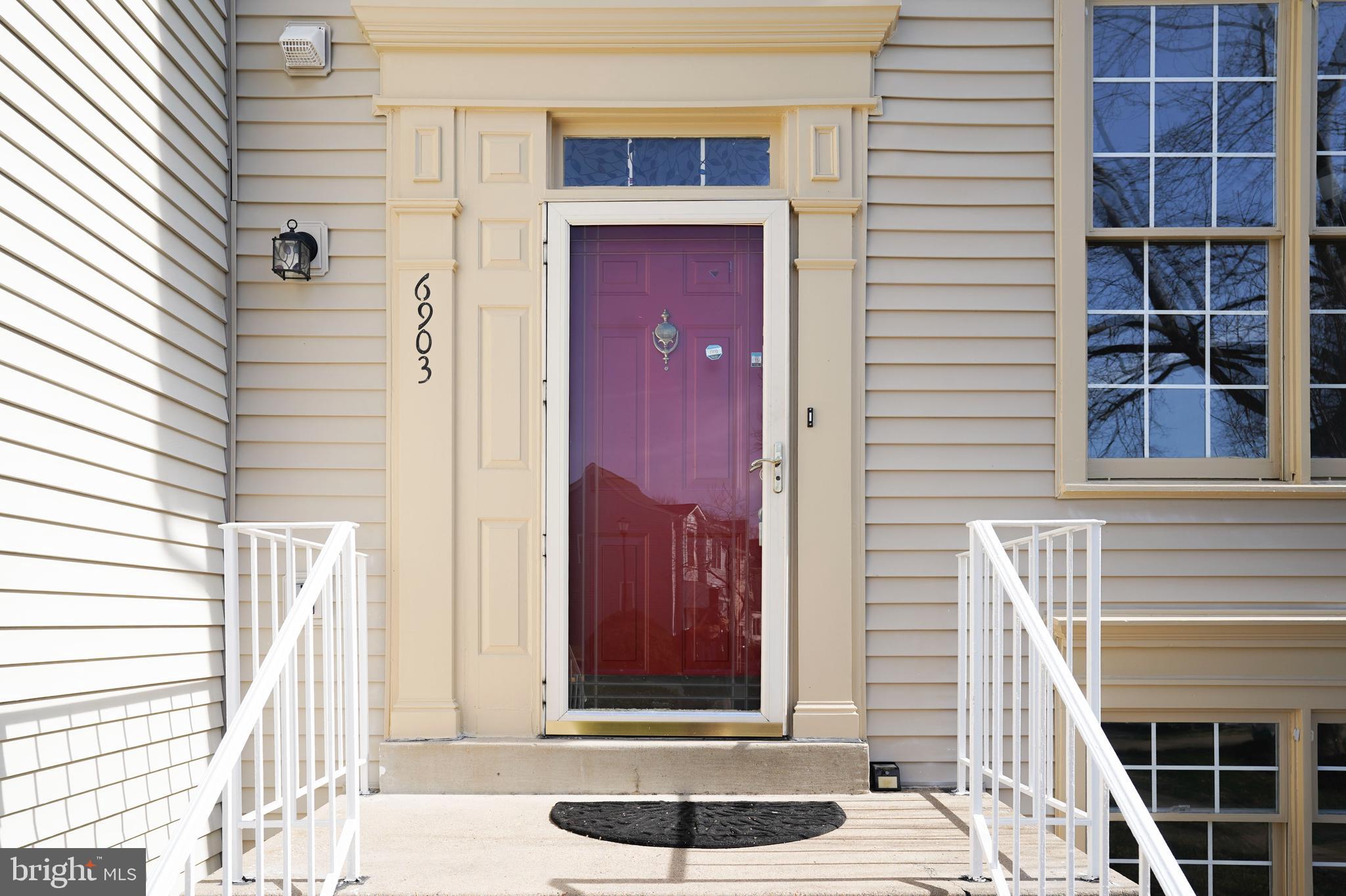 6903 Compton Lane Centreville, VA 20121 - Photo 2 of 35 a front view of a house with a window