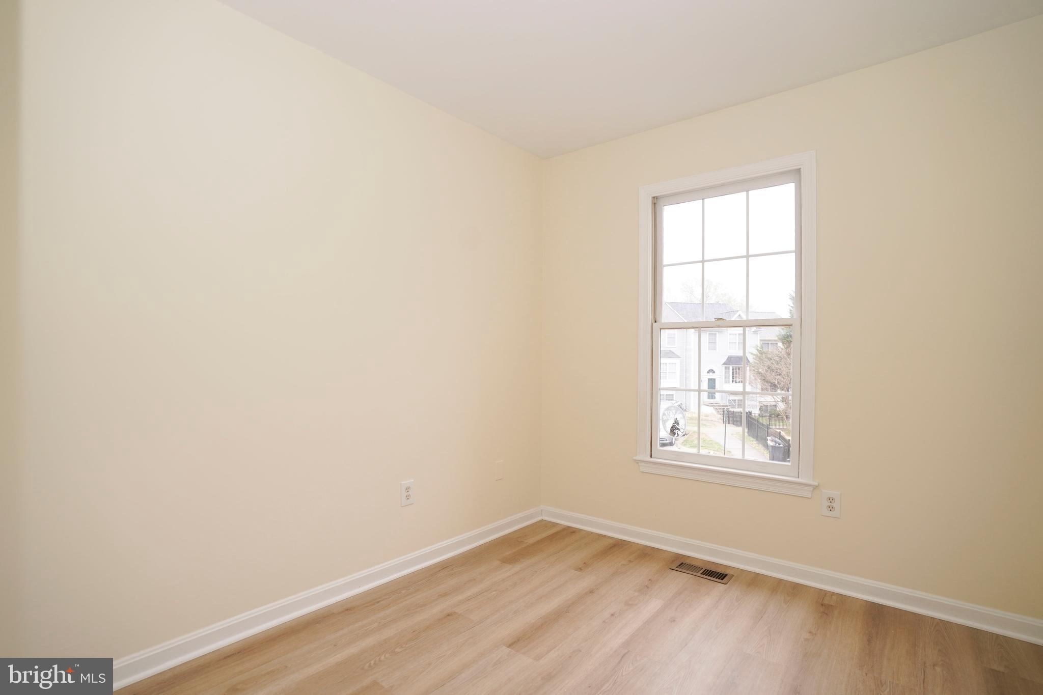 6903 Compton Lane Centreville, VA 20121 - Photo 23 of 35 an empty room with windows
