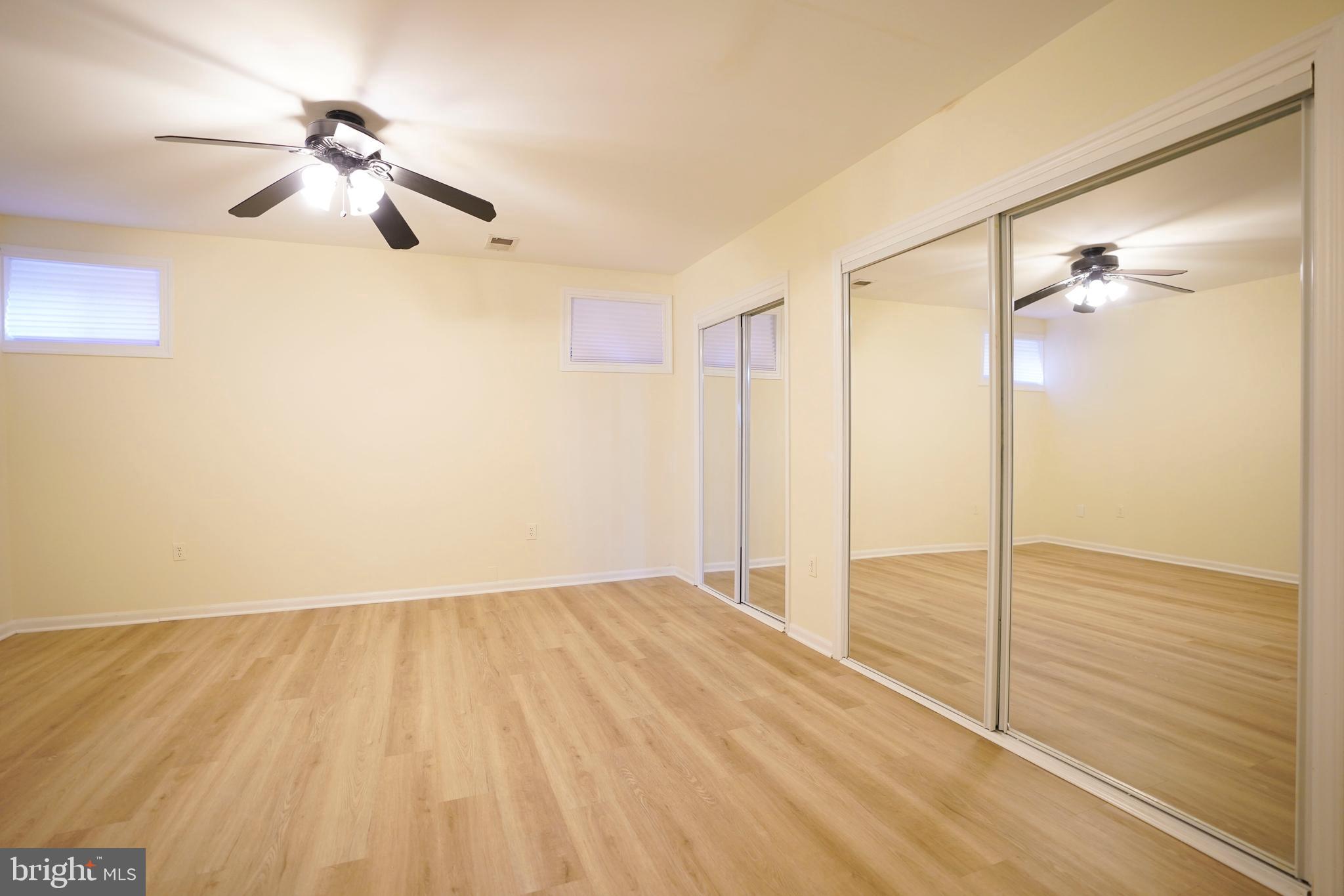 6903 Compton Lane Centreville, VA 20121 - Photo 26 of 35 a view of a room with a ceiling fan